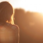 Lady Staring Into Sunset