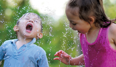 Kids drinking living water.